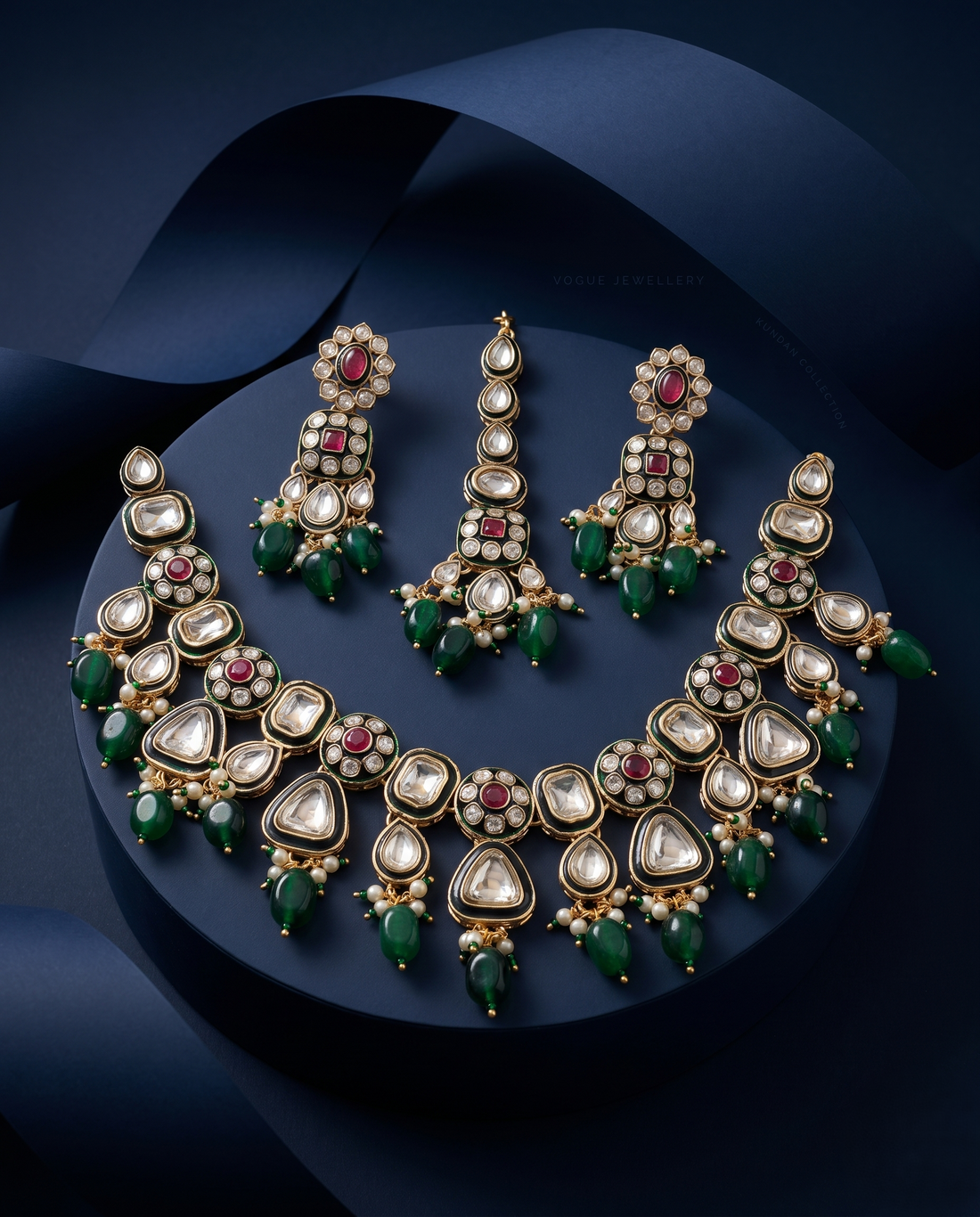 Polki Kundan Necklace Set Green Bead Drops, Ruby Accents & Matching Earrings – Traditional Design with blue background 
