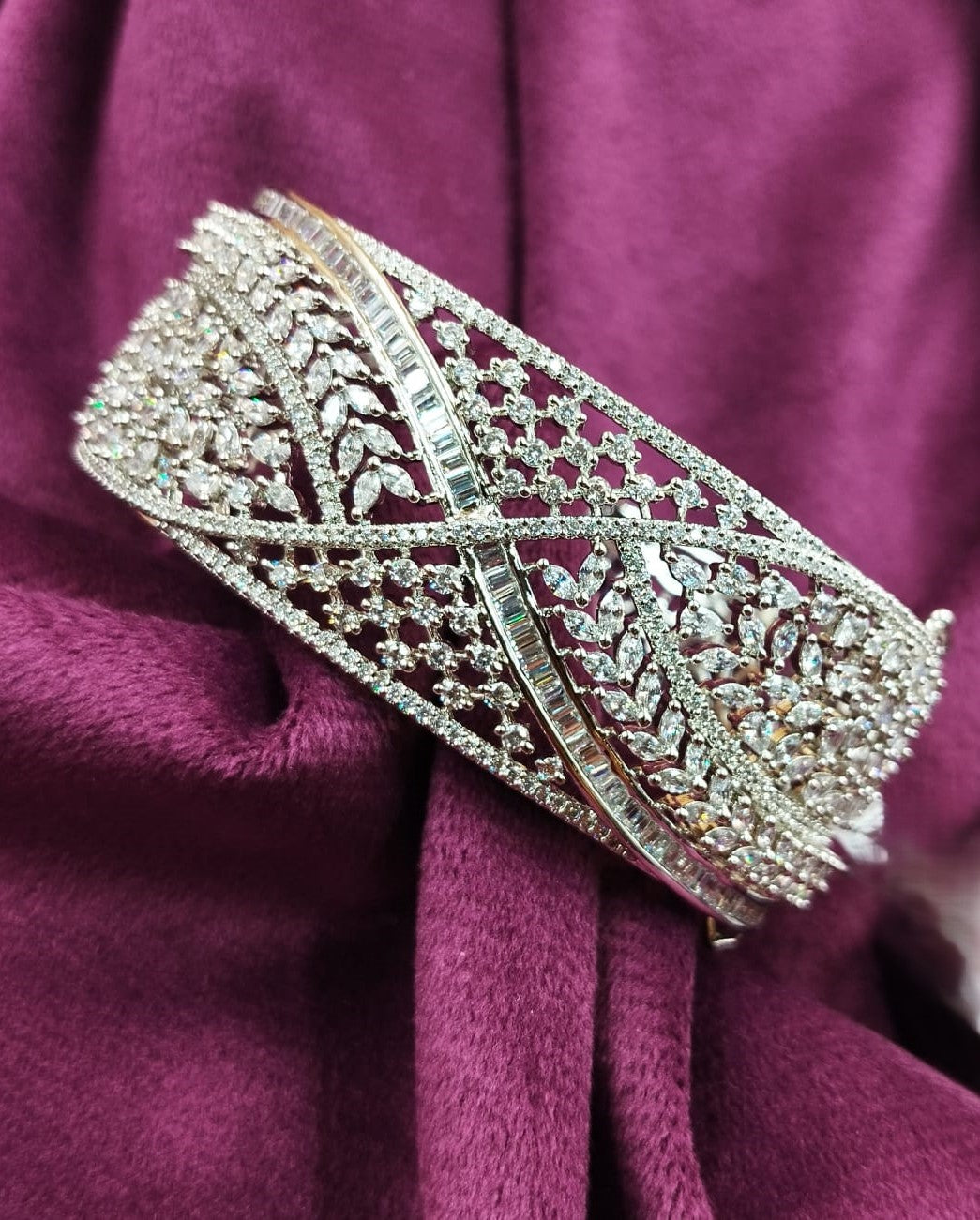 Decorative brooch on a purple fabric background