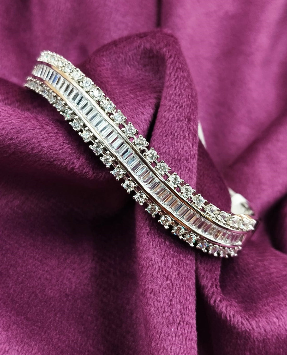 Diamond bracelet on a purple fabric background