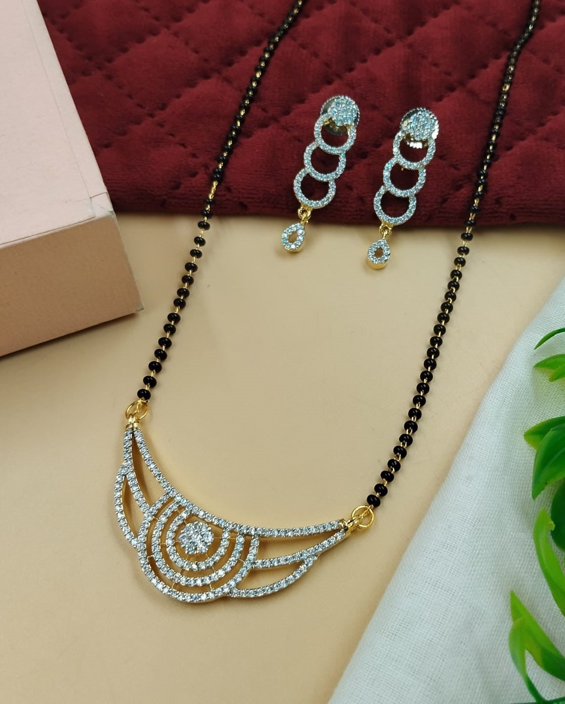 Curved Swirl Diamond-Style Mangalsutra with Black Bead Chain & Long Drop Earrings
