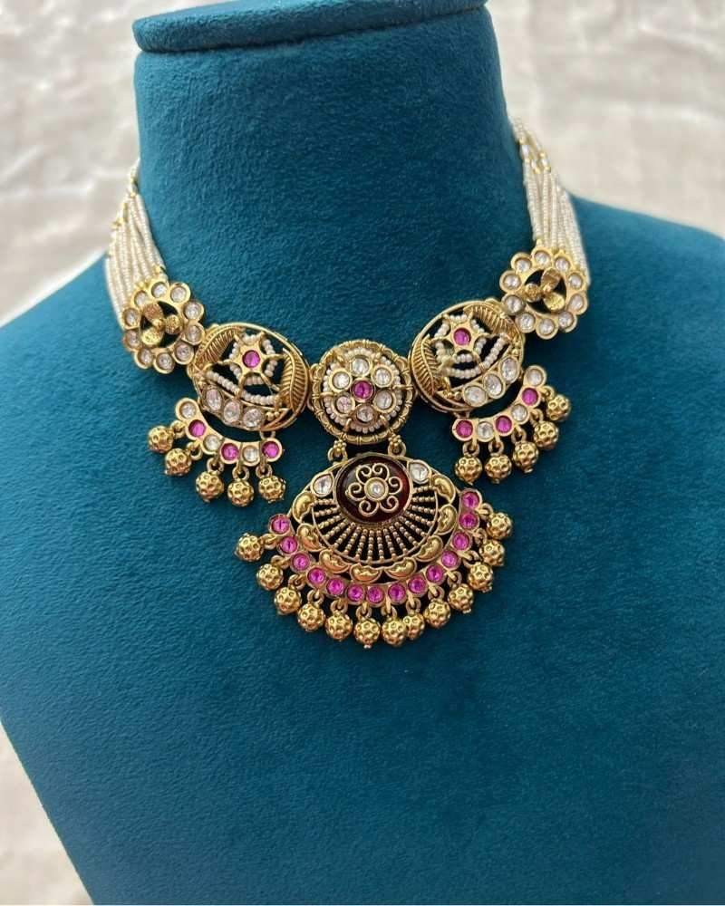 Traditional Gold Finish Pearl Necklace Set with Kundan Work & Pink Stone Pendant