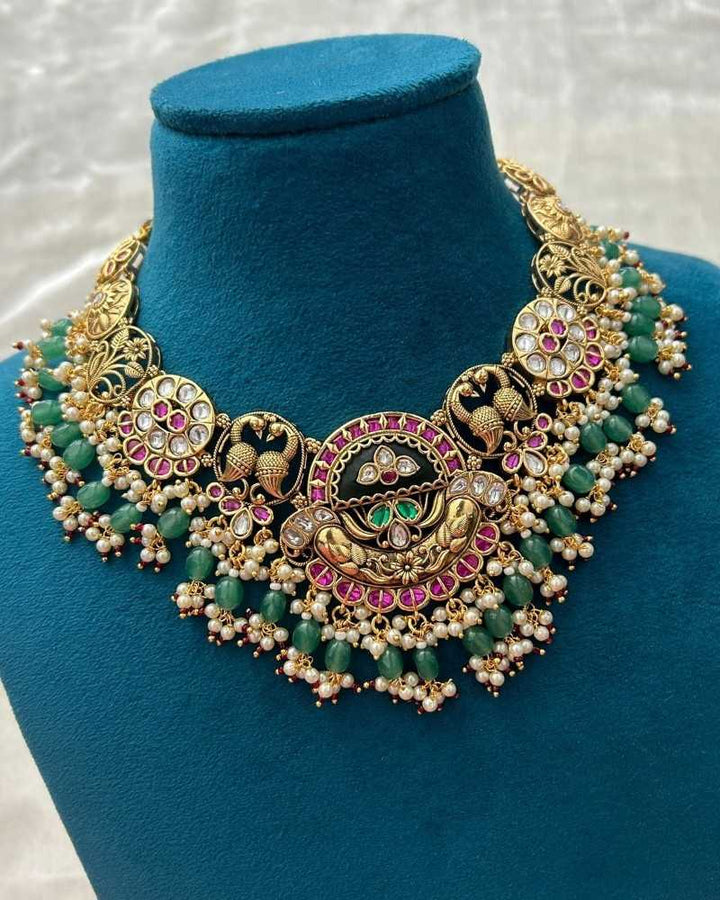 Traditional Gold Finish Temple Necklace Set with Green Beads & Kundan Work