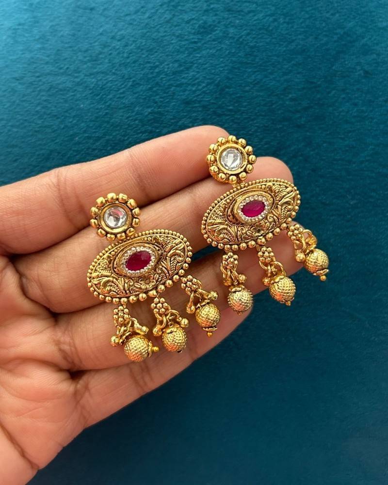 Traditional Gold Finish Necklace Set with Pink & Green Stone Pendant and Ghungroo Drops