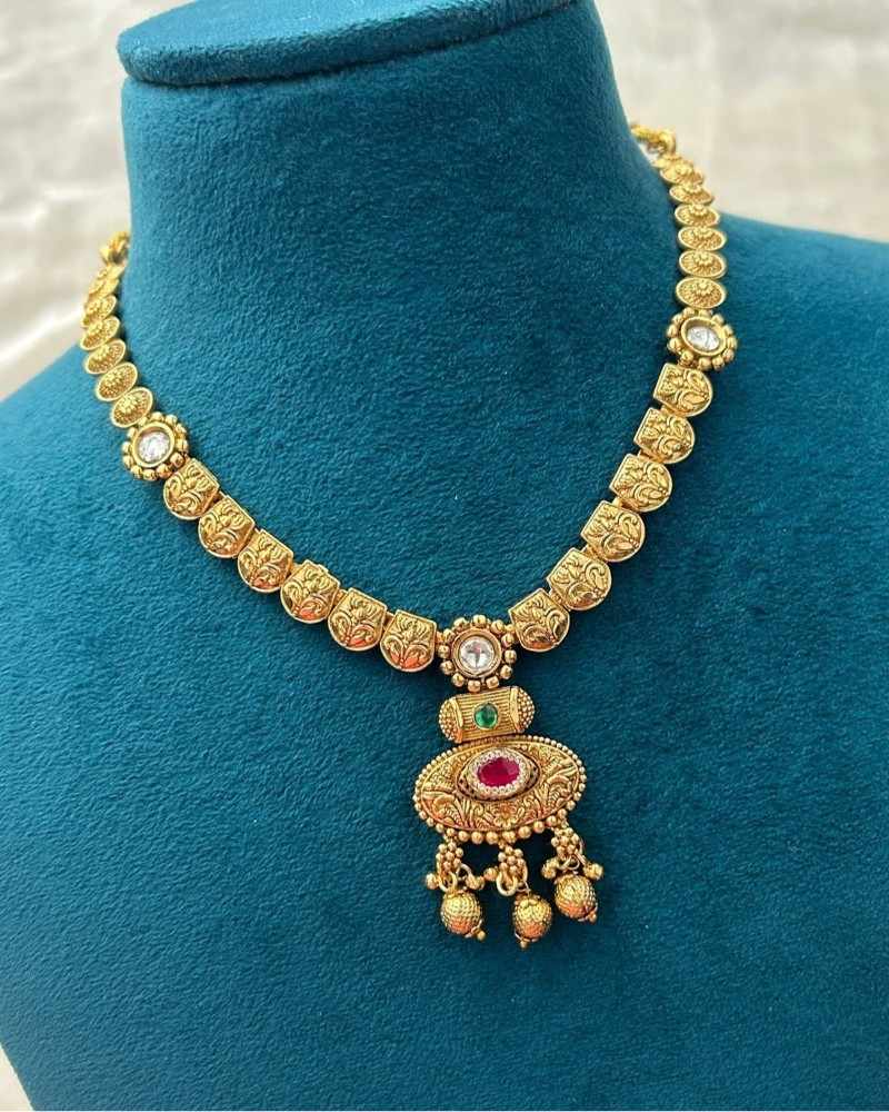 Traditional Gold Finish Necklace Set with Pink & Green Stone Pendant and Ghungroo Drops