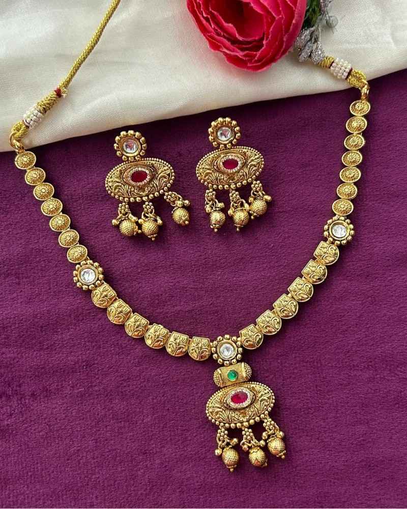 Traditional Gold Finish Necklace Set with Pink & Green Stone Pendant and Ghungroo Drops