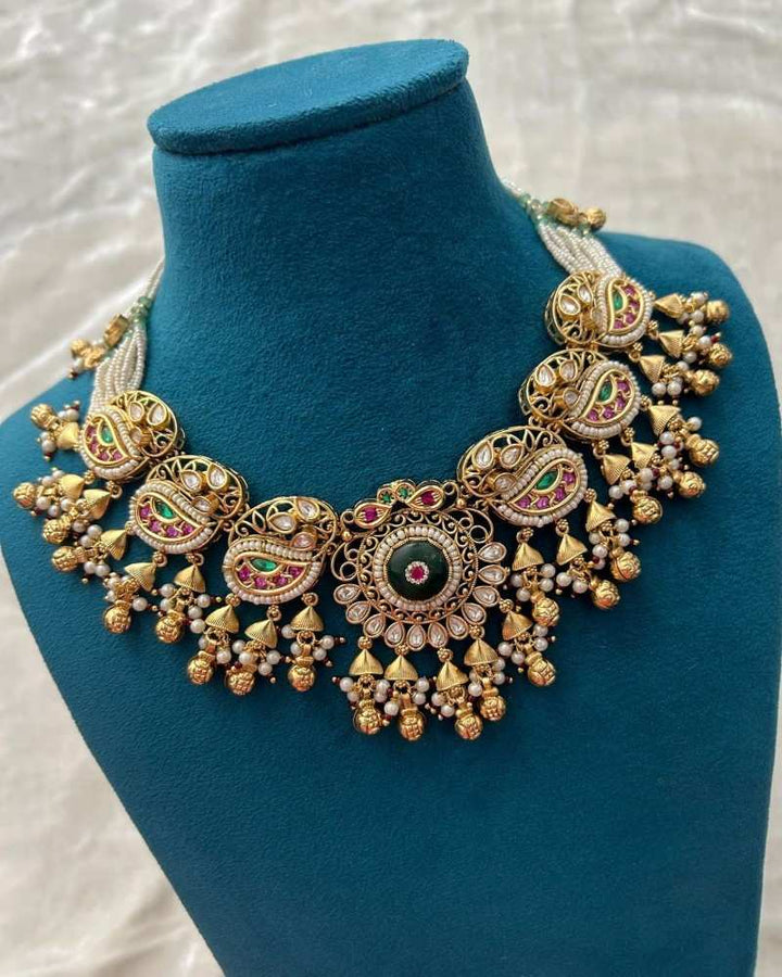 Traditional Gold Finish Kundan Necklace Set with Green Enamel, Pink Stones & Pearl Drops