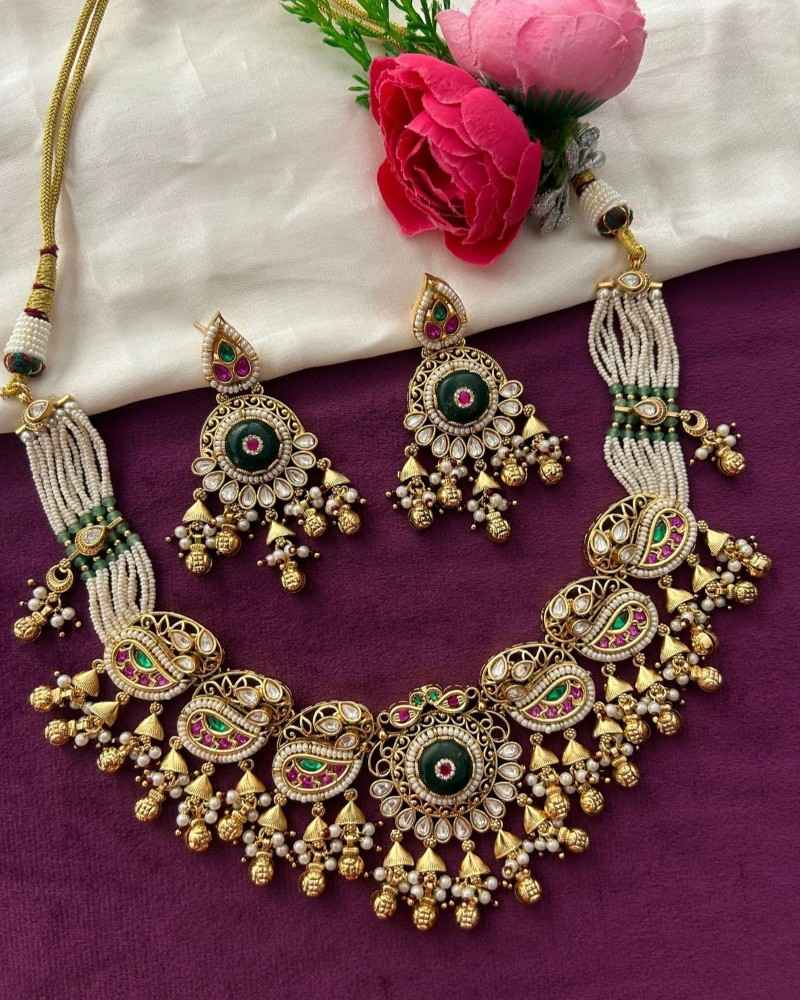 Traditional Gold Finish Kundan Necklace Set with Green Enamel, Pink Stones & Pearl Drops