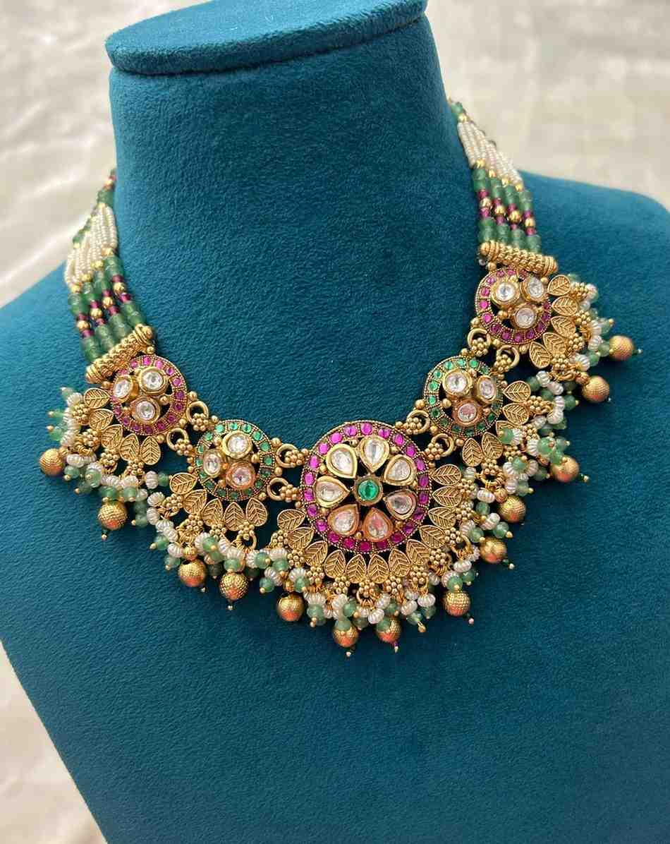 Traditional Gold Finish Pearl Antique Necklace Set with Green Beads, Kundan Work & Pink Stones