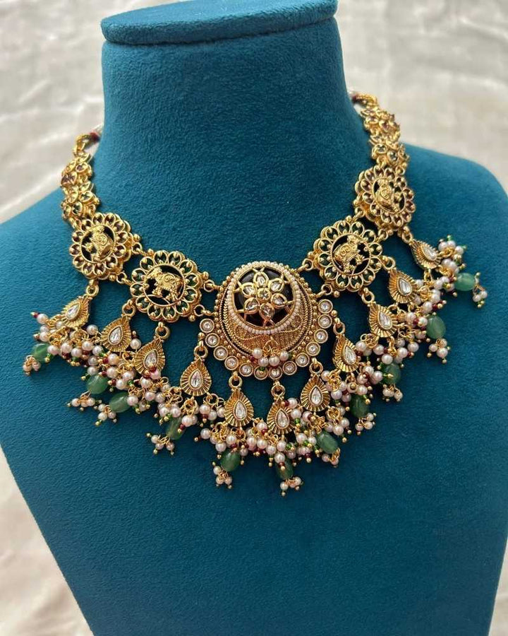 Traditional Gold Finish Temple Necklace Set with Green Beads, Pearl Drops & Kundan Work