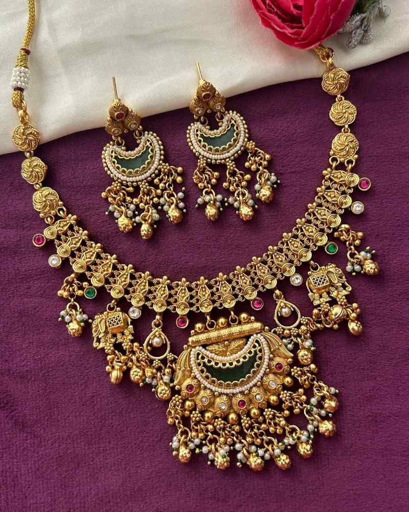 Traditional Gold Finish Temple Necklace Set with Green Enamel & Dangling Earrings