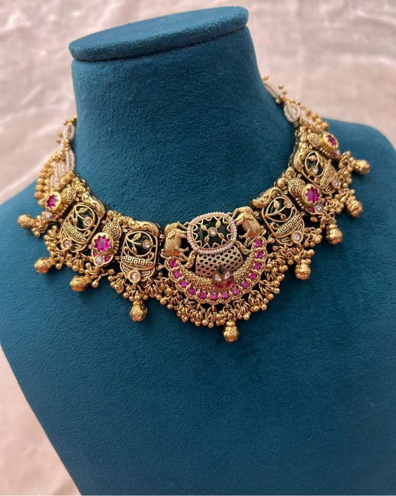 Traditional Gold Finish Pearl Necklace Set with Green Enamel & Pink Stone Work