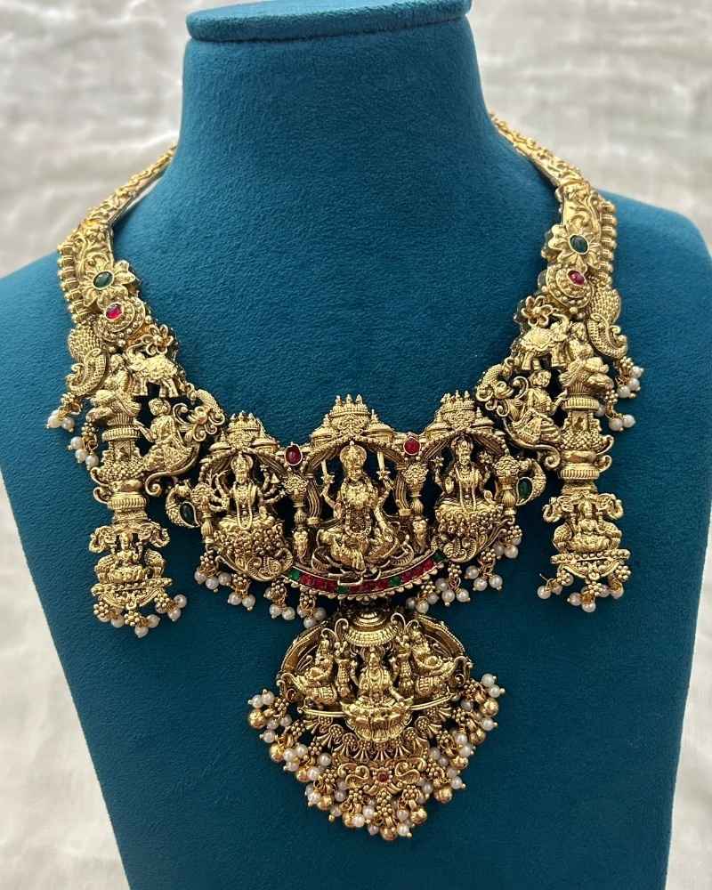 Antique Gold Lakshmi Temple Necklace Set with Pearl Drops and Jhumka Earrings