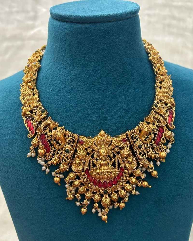 Antique Gold Lakshmi Temple Necklace Set with Ruby Stones and Jhumka Earrings