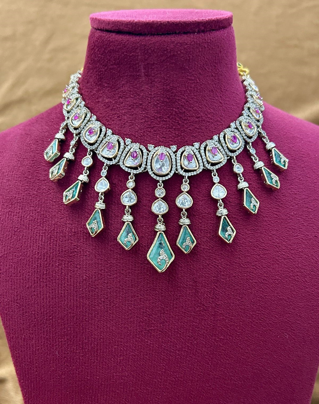 Elegant Kundan Necklace Set with Green Drops and Ruby Detailing Premium Gold Finish
