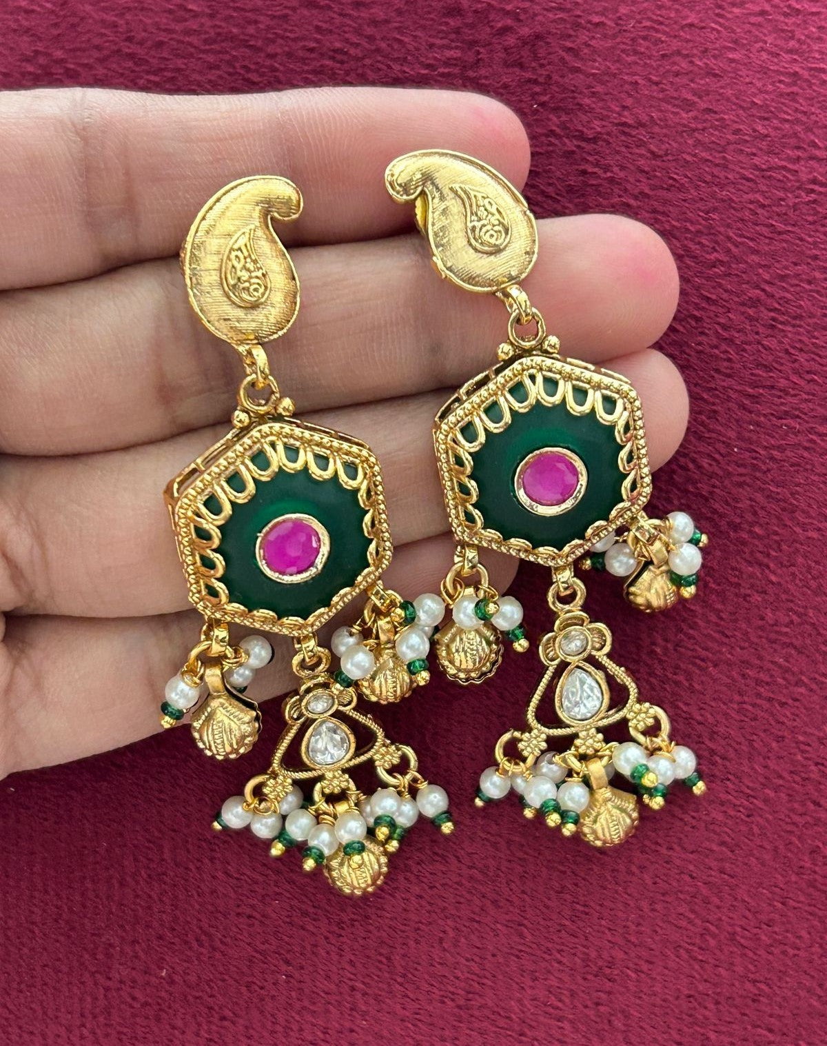 Premium Antique Finish Gold Plated Statement Necklace Set with Green Center Pendant and Ruby Detailing