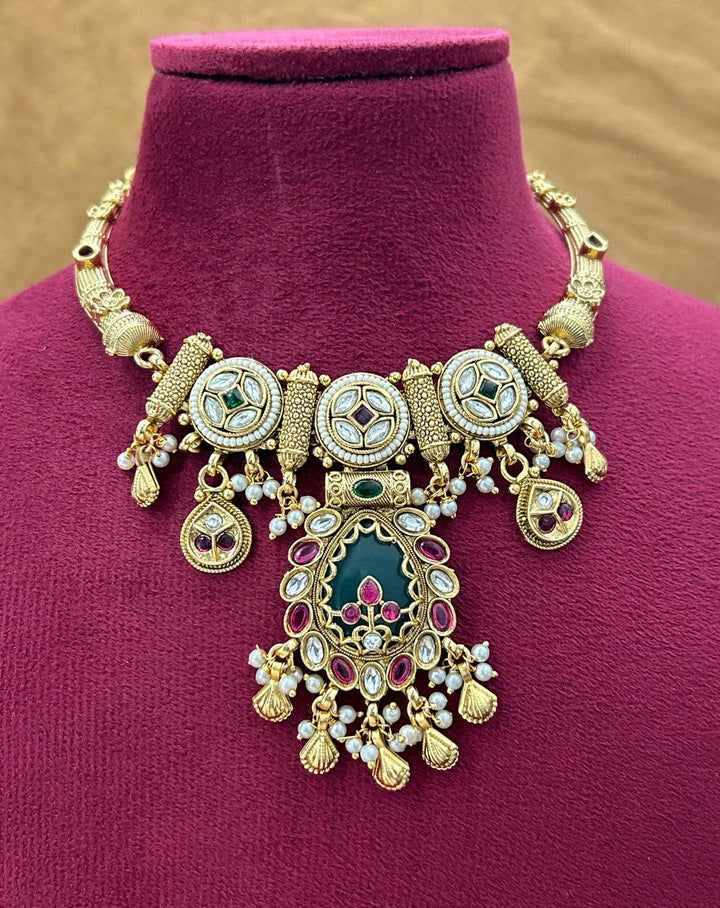 Premium Antique Finish Gold Plated Pendant Necklace Set with Green Center Design and Jhumka Earrings