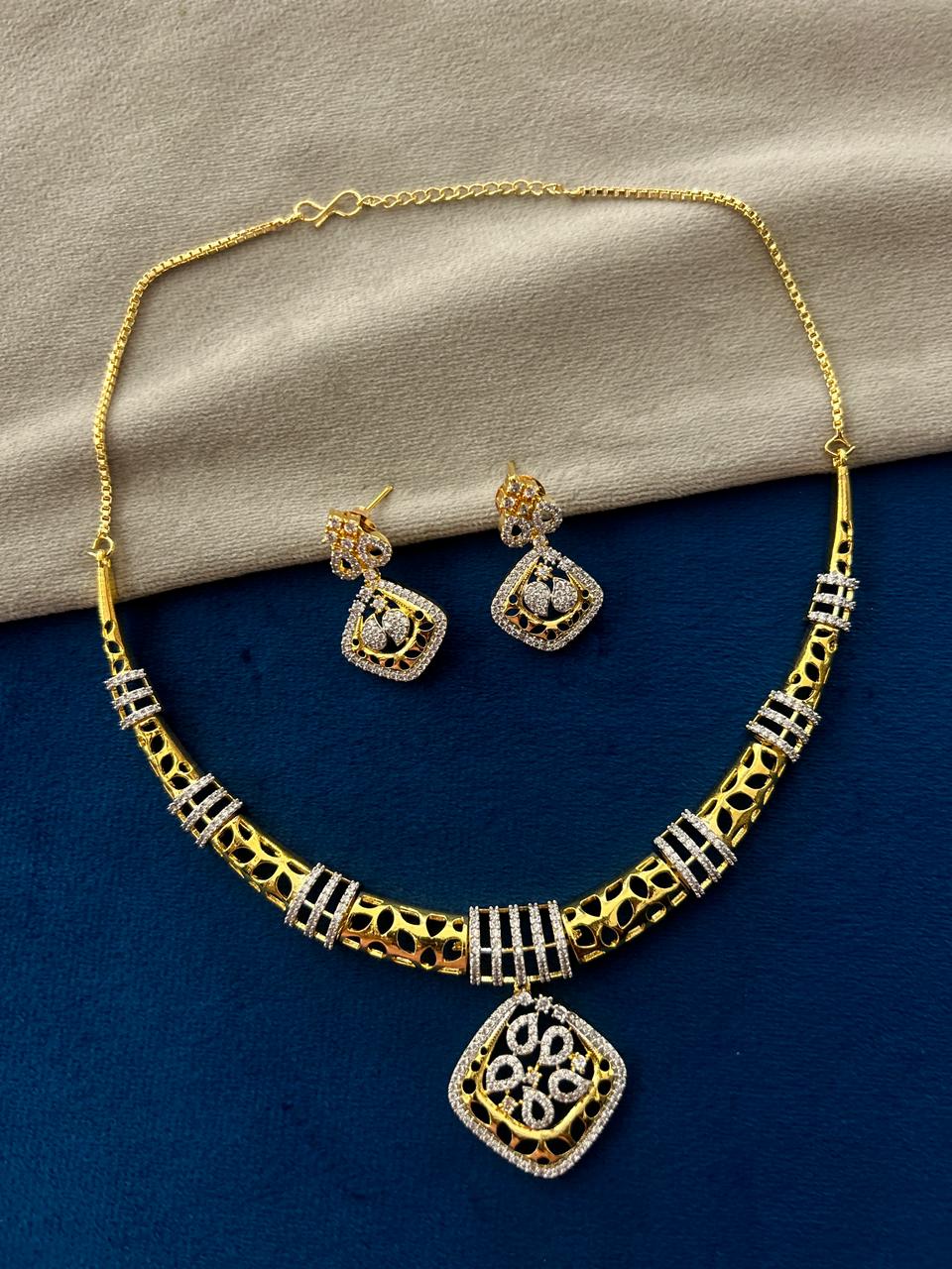 Svarnika Noor Gold Tone Diamond Pendant Necklace Set with Earrings