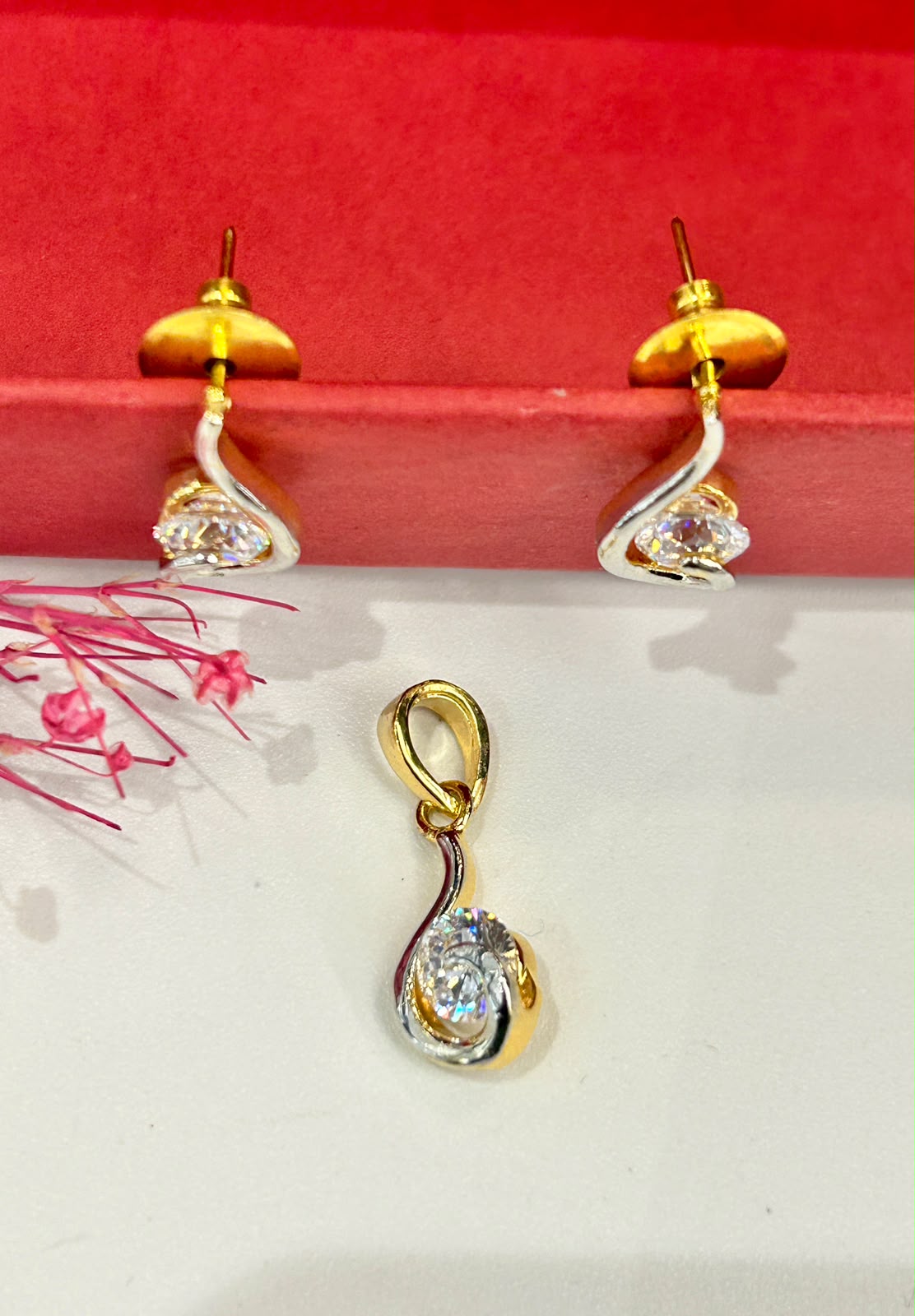 Premium Sparkle Dual Tone Diamond Swirl Pendant with Chain & Matching Earrings
