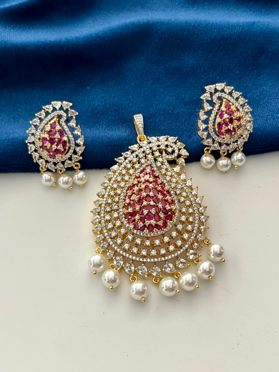 Mayurika Pearl Drop Pendant Set with AD Stones  Gold Finish