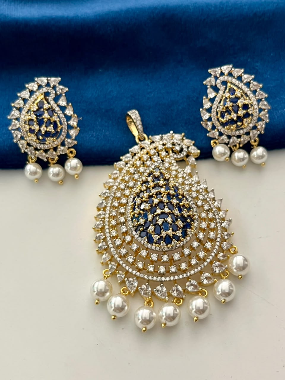 Mayurika Pearl Drop Pendant Set with AD Stones  Gold Finish