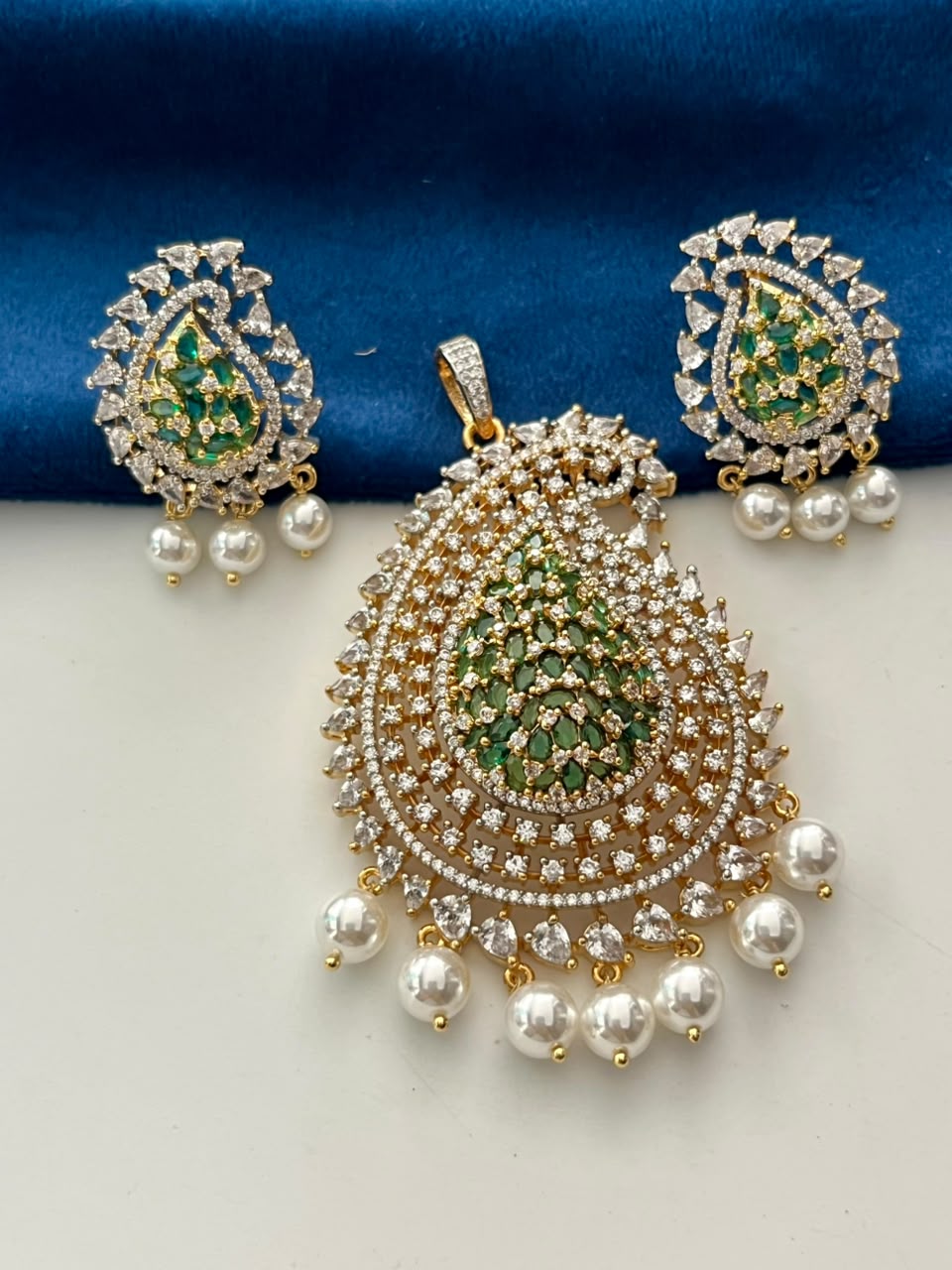 Mayurika Pearl Drop Pendant Set with AD Stones  Gold Finish