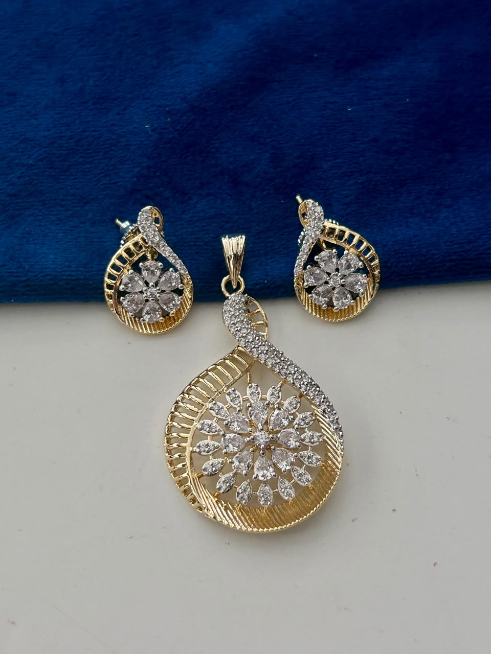 Vritika Dual Tone CZ Floral Pendant Set with Earrings