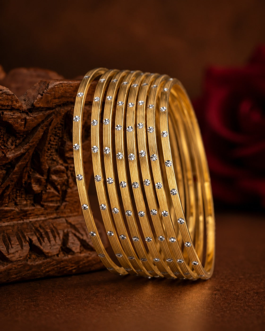 Swarna Rekha Gold-Tone Stone-Studded Thin Bangles Set ( set of 8 )