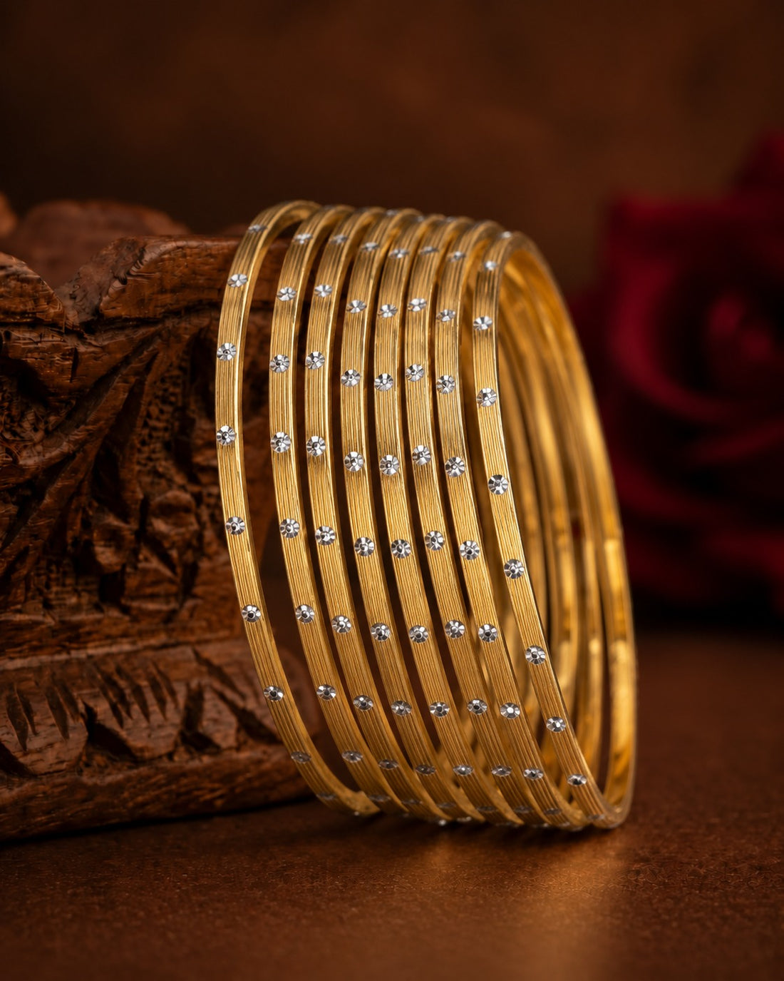Swarna Rekha Gold-Tone Stone-Studded Thin Bangles Set ( set of 8 )