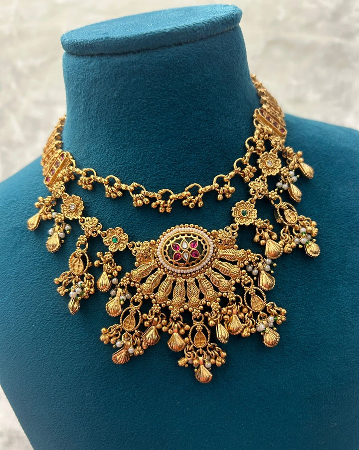 Antique Gold Heavy Kundan Necklace Set with Floral Motifs & Ghungroo Danglers