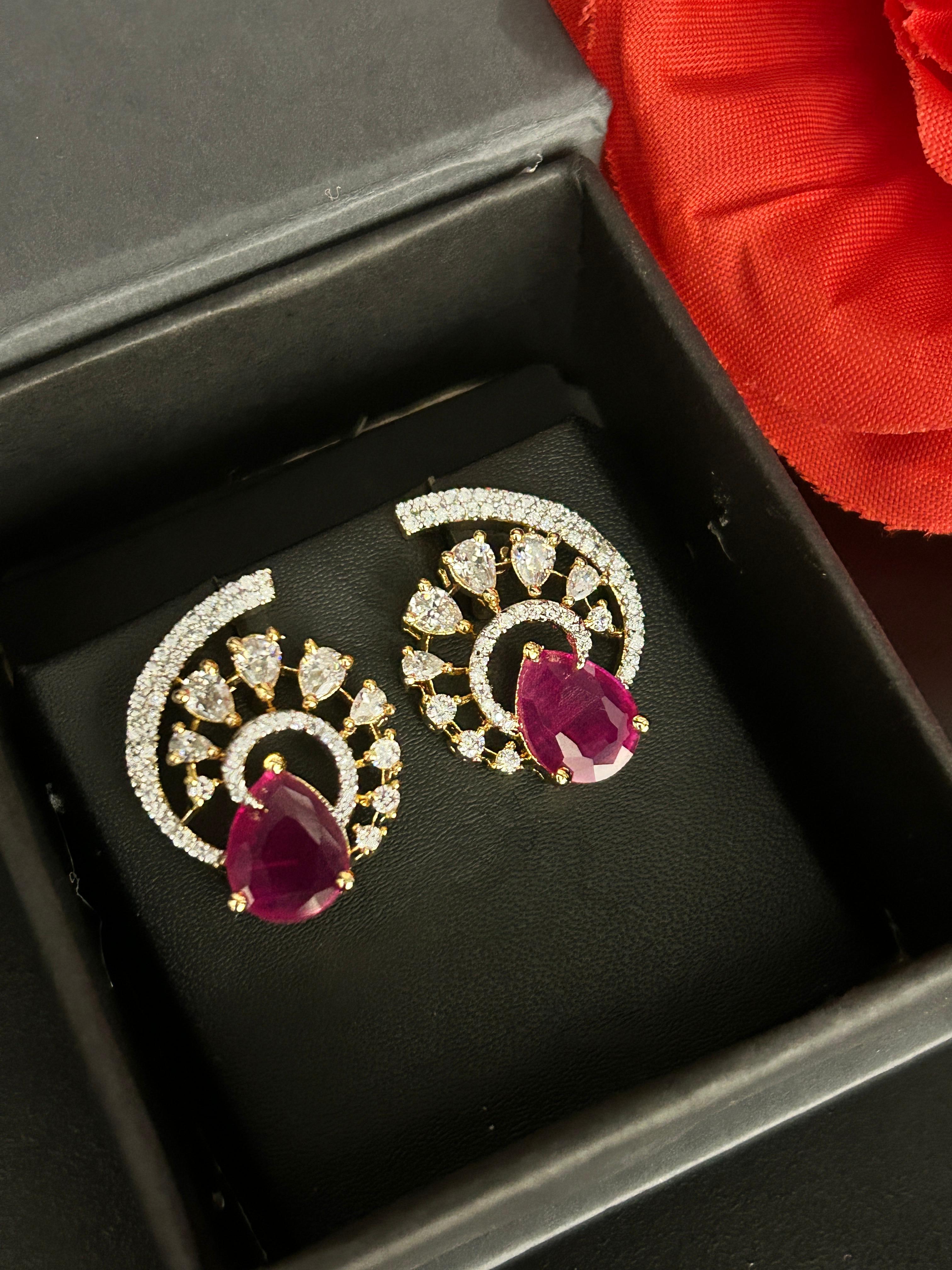 Premium Regal Spiral Drops – Gold Polish Diamond Statement Earrings
