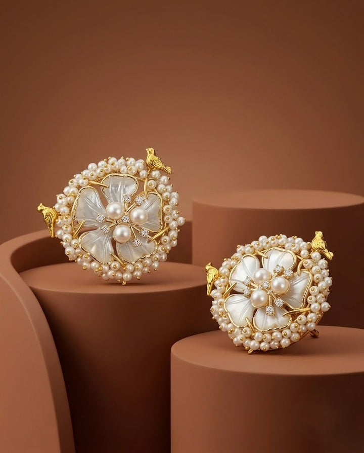 Floral Pearl Stud Earrings with Bird Motif & Shell Petal Design in Gold Finish