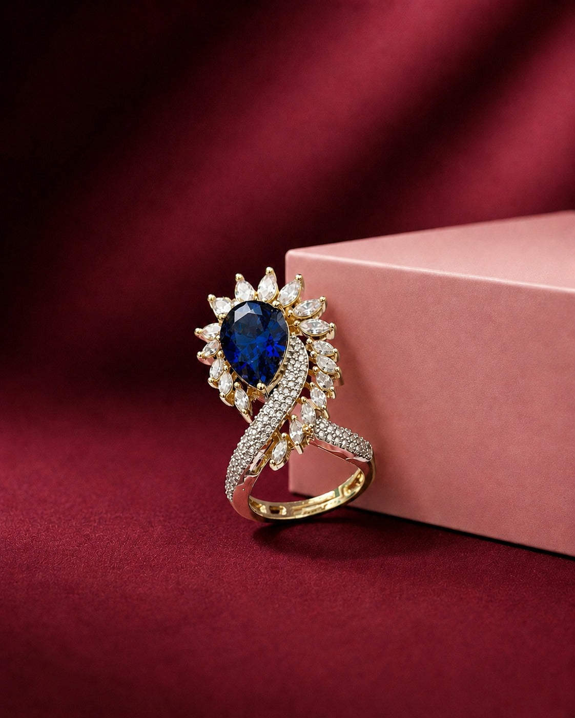 deep navy blue ring with deep red  marron background 