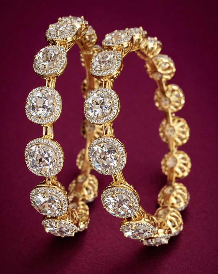 Stylish bangle set showcasing interconnected round motifs with classic gold finish