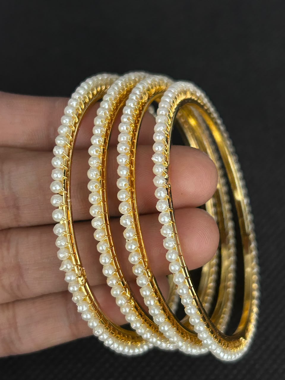 Avira Pearl Edge Gold-Finish Bangles – Set of 4