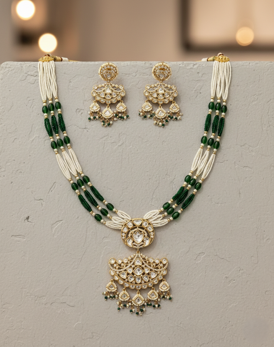 Green and white beaded kundan necklace set paired with elegant chandelier earrings
