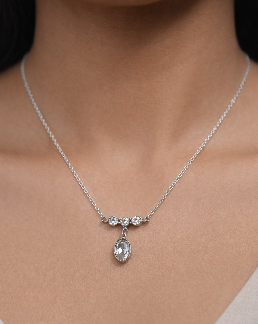 Silver-finish diamond-style pendant necklace featuring an elegant oval drop for women