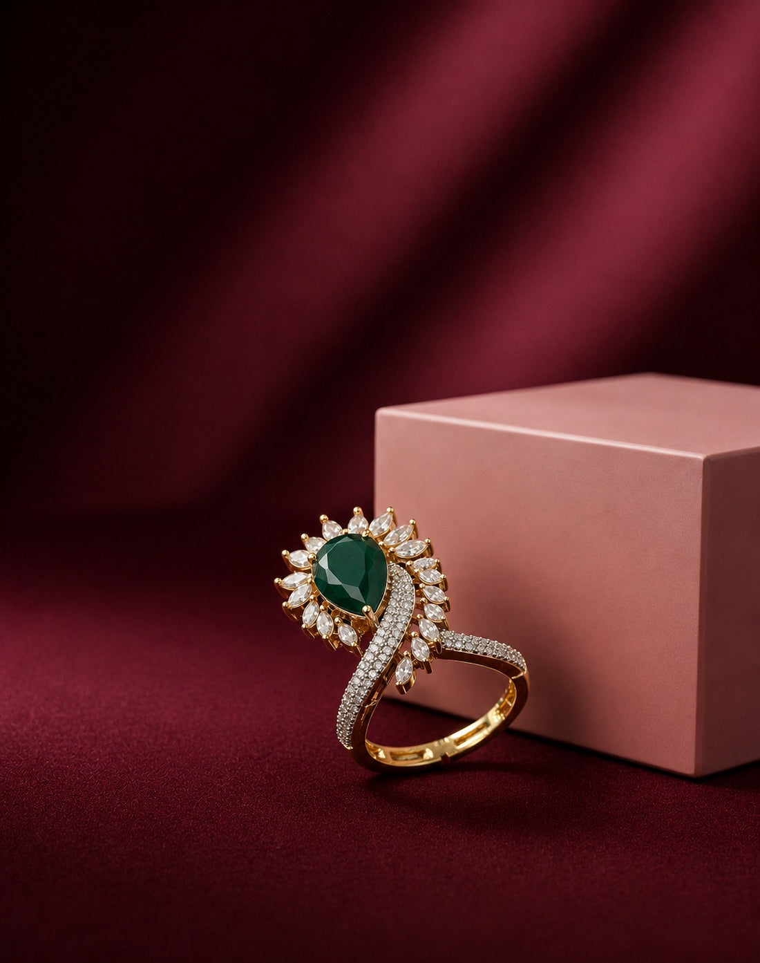 emerald green with deep maroon background 