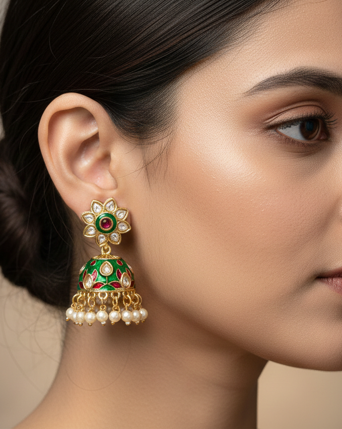 decorative earring with gold, green, and pearl 